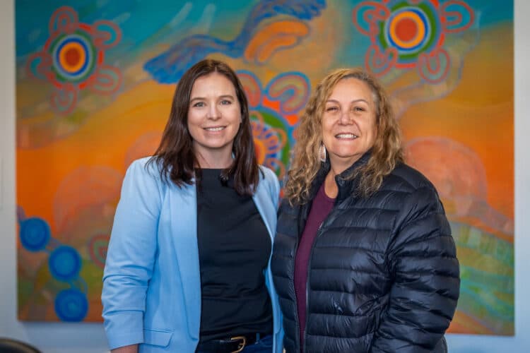 Anne Connors, SRA Managing Director, with artist Saretta Fielding. Image: Swietelsky Rail Australia