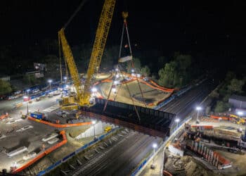 The new Broadford-Wandong Road bridge was lifted into place by a 600-tonne mobile crawler crane. Image: Inland Rail